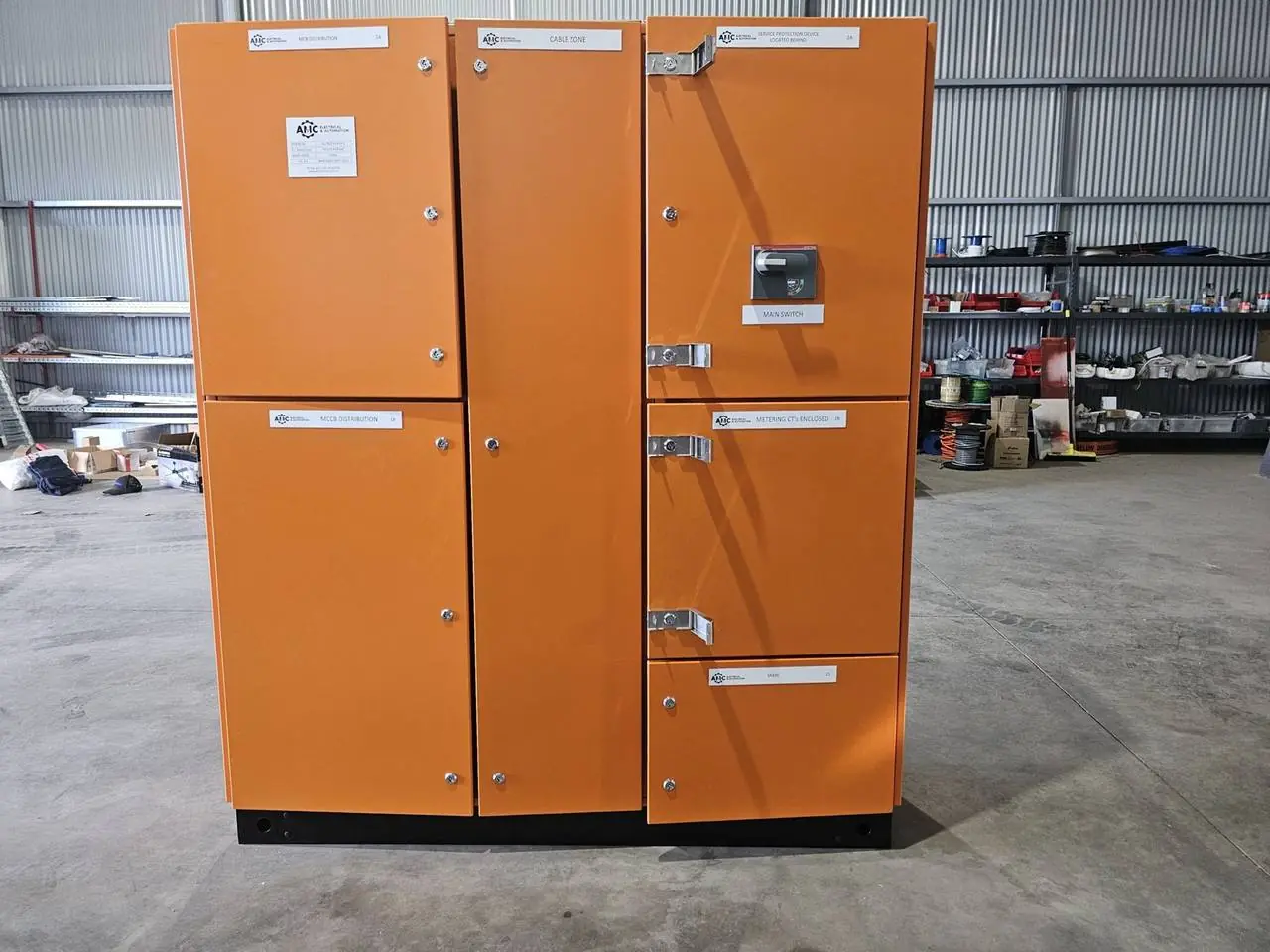Completed orange main switchboard in the workshop