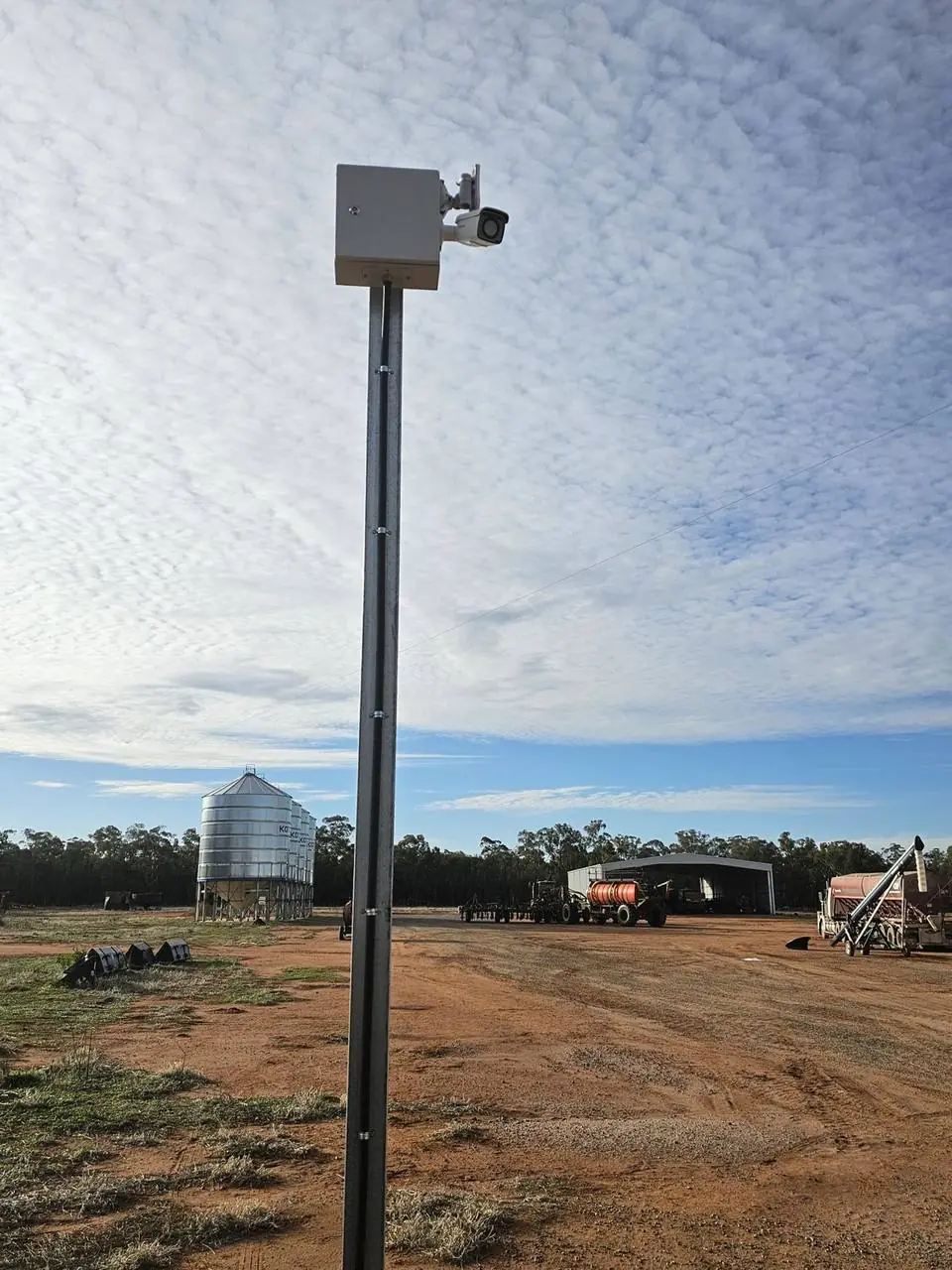 CCTV pole overlooking farm sheds