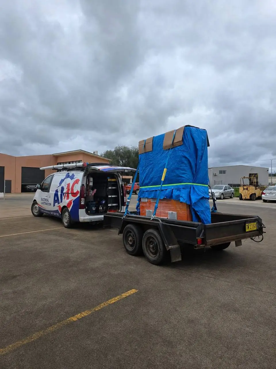 The board strapped on the trailer for delivery