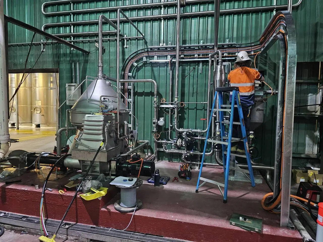 AMC electrician installing cabling at a process plant